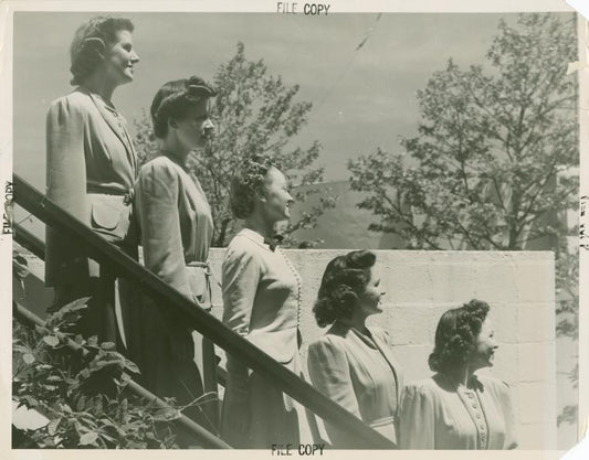 American Telephone & Telegraph Exhibit - Side view of employees
