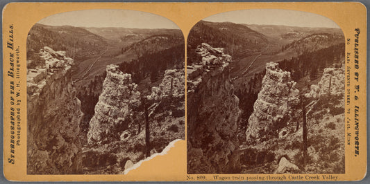 Wagon train passing through Castle Creek valley.