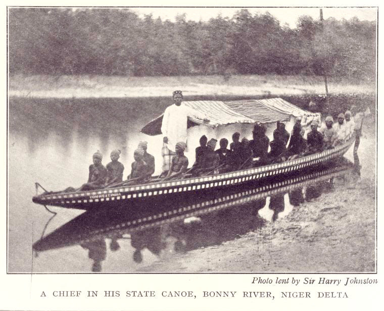A Chief in his state canoe, Bonny River, Niger Delta.