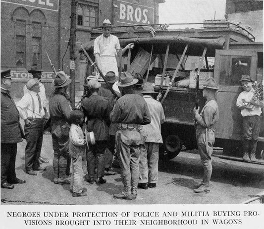 Negroes buying provisions brought into their neighborhood.