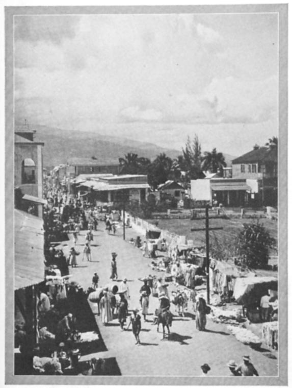 In Petit Goâve the sunshine is of so intense a clarity that clarity that the life surging in the streets is seen as purely objective.