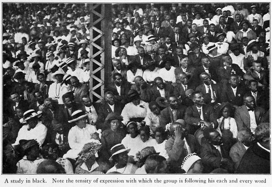 A Black study; Note the tensity of expression with which the group is following his each and every word.