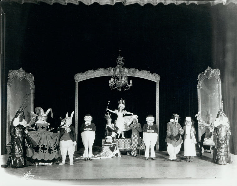 Ula Sharon and Carl Randall (center stage) in the "Alice in Wonderland" scene in the stage production Music Box Revue