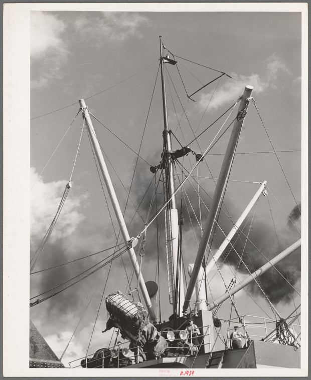 Loading of cotton for export. Notice man operating winch. Port of Houston, Texas