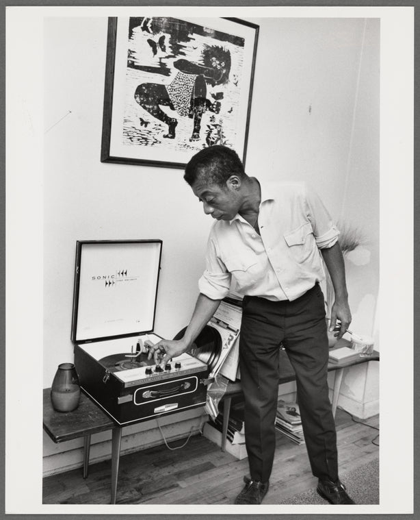 Baldwin turning knob on record player, 1963