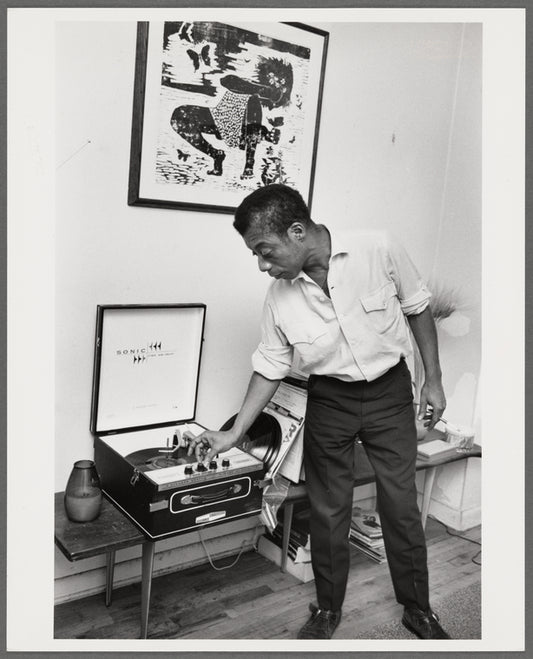 Baldwin turning knob on record player, 1963